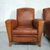 Coppia di poltrone club francese in cuoio cognac vintage 