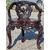 Quattro poltrone a 3 gambe orientali