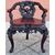 Quattro poltrone a 3 gambe orientali
