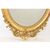 SPECCHIO ANTICO OVALE CON CIMASA, FIORI E VOLUTE, SPECCHIERA  ANTICA, CORNICE DORATA, DEL XIX SECOLO. (SPO171)