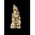 Scultura okimono in avorio raffigurante personaggio maschile con fanciullo e scimmia.Giappone.