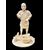 Scultura okimono in avorio raffigurante personaggio maschile con treccia e cesto.Giappone.
