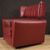 Italian armchair with footstool in leather from the 80s