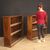 Pair of Italian bookcases in walnut wood with glass doors