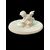 Piccola scultura in avorio raffigurante cupido che affila la freccia.