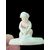 Piccola scultura in avorio raffigurante cupido che affila la freccia.