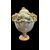 Vaso in maiolica con motivo a tralci d’una in rilievo,prese a forma di testa di ariete e coperchio con presa a forma di limone.manifattura Dallari,Sassuolo. 