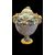 Vaso in maiolica con motivo a tralci d’una in rilievo,prese a forma di testa di ariete e coperchio con presa a forma di limone.manifattura Dallari,Sassuolo. 
