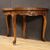Demilune table with geometric decorations from the 20th century