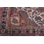 Antique KIRMAN RAVAR with a light background     