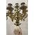 Coppia di candelieri in bronzo dorato