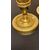 Coppia di candelieri Impero in bronzo dorato e patinato scuro.