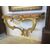 golden console with wooden floor marbled