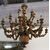 Large and particular chandelier in carved and lacquered wood     
