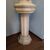 White marble statue with base, depicting Venus     