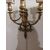 Coppia di appliques a tre luci in bronzo dorato
