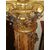 Due colonne in legno sfaccettato 