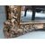 Specchiera rettangolare in legno dorato con cimasa a ramages e motivi floreali