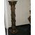 Due colonne in legno sfaccettato 