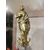 Composizione ex voto in pietra con coralli e statuine in bronzo della Vergine e San Diocleziano entro teca in vetro - '800