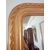 Specchiera in legno dorato con motivo a torchon