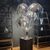 Lampada da Terra Imponente: Il Fascino Vintage della Kenzia in acciaio satinato