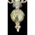 Lampada applique in bronzo pieno a due fuochi.
