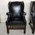 Coppia di poltrone inglese bergere in pelle nera del XX secolo 