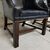 Coppia di poltrone inglese bergere in pelle nera del XX secolo 