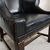 Coppia di poltrone inglese bergere in pelle nera del XX secolo 