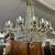 Splendido Antico Lampadario in bronzo dorato e cristalli a 1 luci . Primi 900 . Mis 90 x 70 . H100