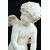 Scultura antica in alabastro raffigurante Cupido. Francia XIX secolo.
