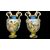 Coppia di vasi in maiolica decorati con putti in ambiente agreste.Ginori
