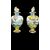 Coppia di vasi in maiolica decorati con putti in ambiente agreste.Ginori