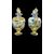 Coppia di vasi in maiolica decorati con putti in ambiente agreste.Ginori
