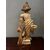 Scultura di legno "Putto degustando miele"