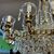 Splendido Antico Lampadario in bronzo dorato e cristalli a 1 luci . Primi 900 . Mis 90 x 70 . H100