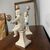 Antica coppia di putti a candelabri Angelo Minghetti Bologna. Fine 800 su piedistallo firmati. H 37 
