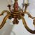 Antico Lampadario Sei Bracci epoca XIX secolo dipinto rubino e oro . Tutto intagliato . Altezza cm 80 diametro cm 80 