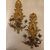 Coppia di appliques in legno dorato e laccato