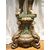 Scultura lignea argentata raffigurante un putto.