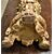 Scultura lignea argentata raffigurante un putto.