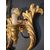 Grande applique in legno dorato intagliato