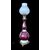 Lampada in porcellana con decoro floreale.
