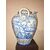 &#39;Medici&#39; vase in majolica with turquoise Savona style decoration with characters in a rural setting and lateral grips with masks.Cantagalli Florence.     