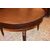 Grande tavolo circolare allungabile di inizio 1800 in legno di noce