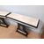 Coppia di consolle art deco in legno nero e pergamena con decori a bassorilievo