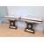 Coppia di consolle art deco in legno nero e pergamena con decori a bassorilievo