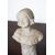 Busto in alabastro raffigurante una giovane donna 