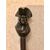 Stick with ebony knob depicting a character with a hat.     